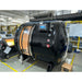 Macy-Pan HE5000 Mini 2.0 ATA Hard Shell Hyperbaric Chamber Front Angle View Of Black Color In A Manufacturing Facility