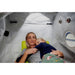 Macy-Pan ST2200 Two Person Hyperbaric Chamber With A Mother And A Daughter Hugging While Sleeping Inside