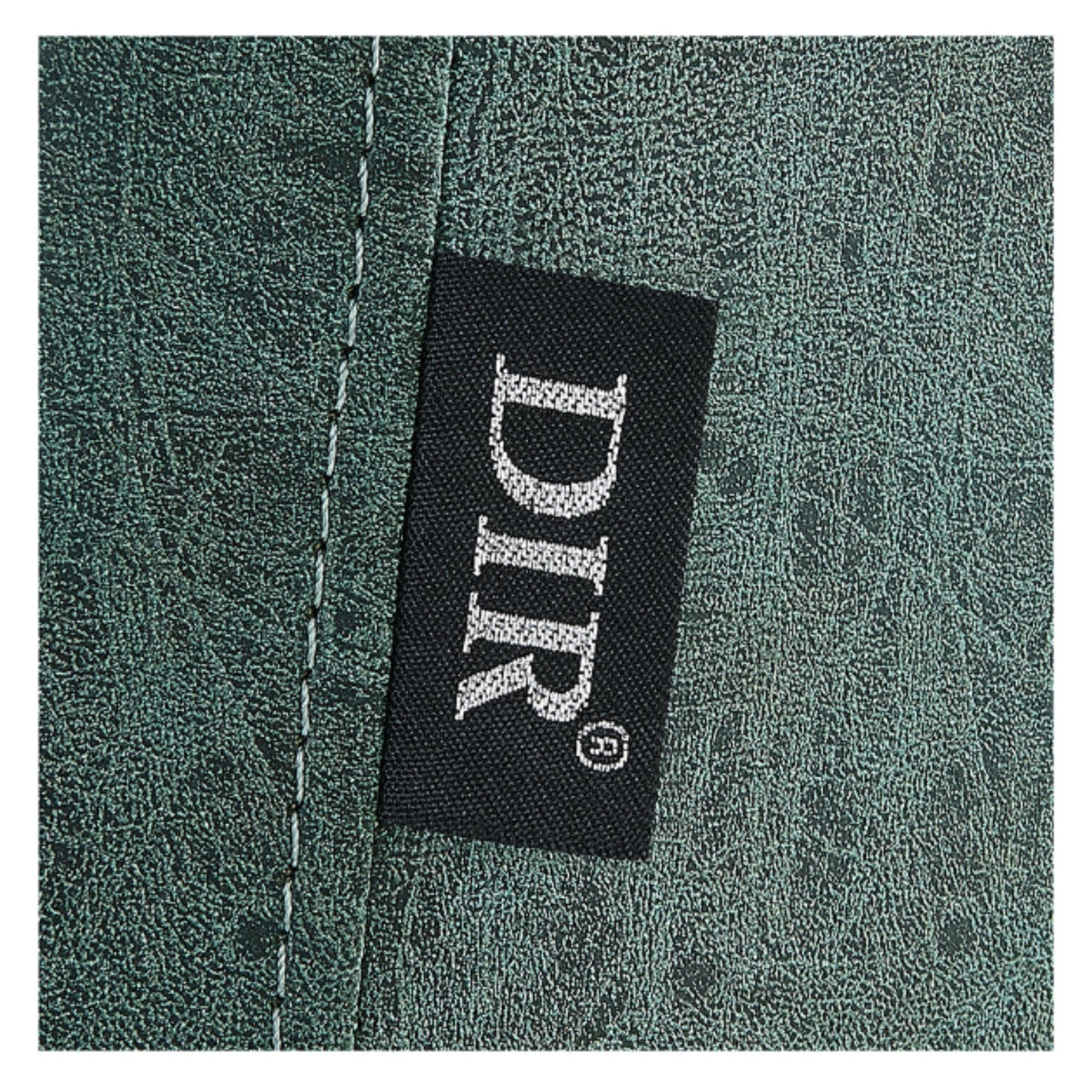 Majesty Antique Barbershop Chairs Close-Up View Of Green Upholstery With Brand Name