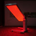 Merican M2N Red Light Therapy Panel Angled Position Operated In Dark Room