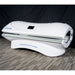 Merican M4N Red Light Therapy Bed White Variants Angled View Lights Off On Black Background With Wooden Design Floor
