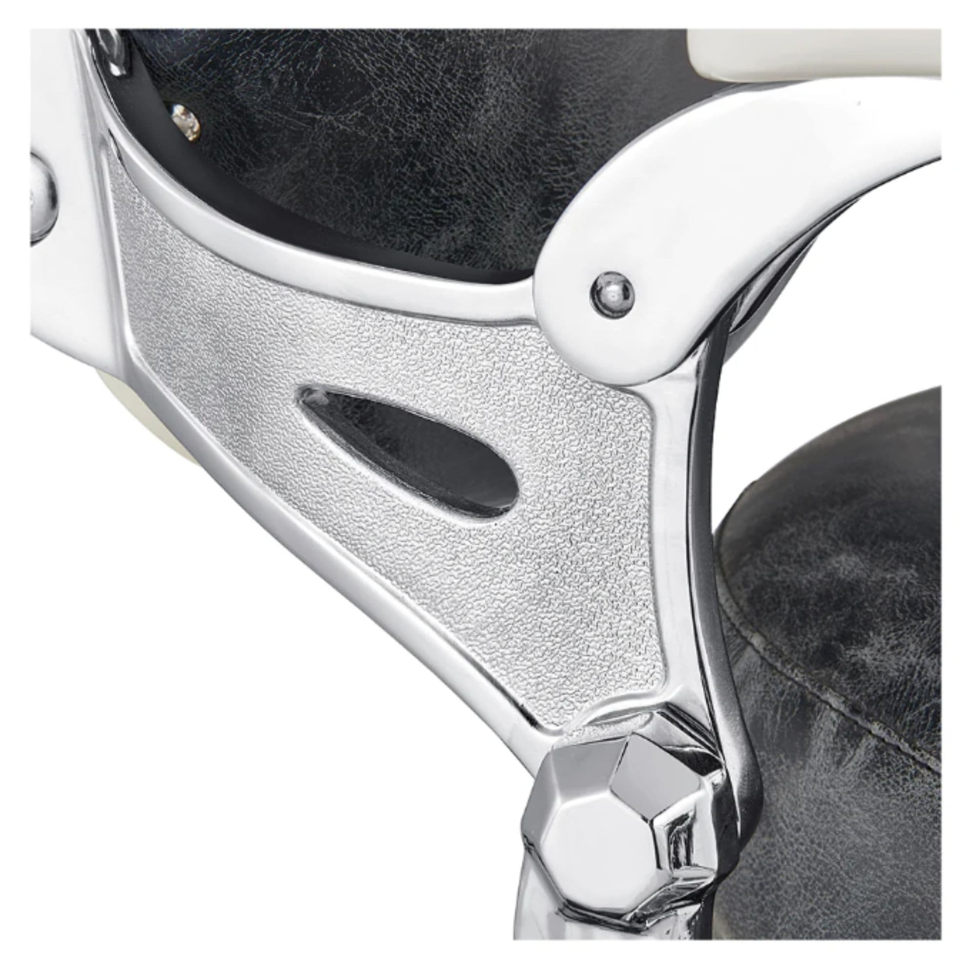 Mikado Vintage Barber Chair Close-Up View Of Decorative Chrome Armrest Support And Vintage Black Upholstered Seat