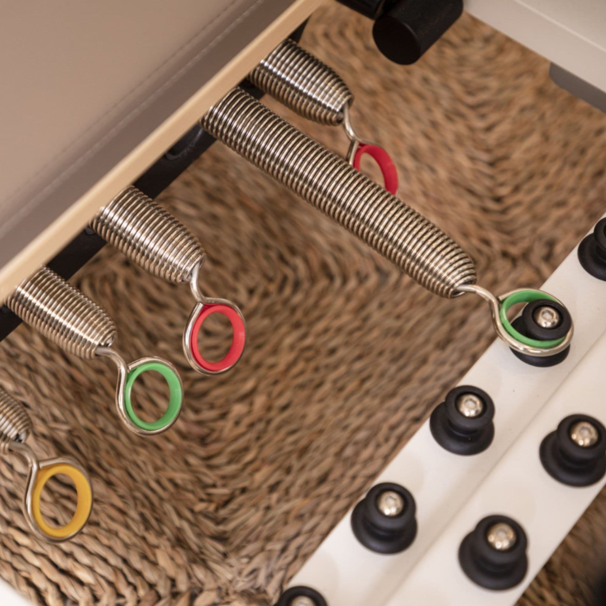 Nubium Reformer Close-Up View Of Color-Coded Springs And Resistance System