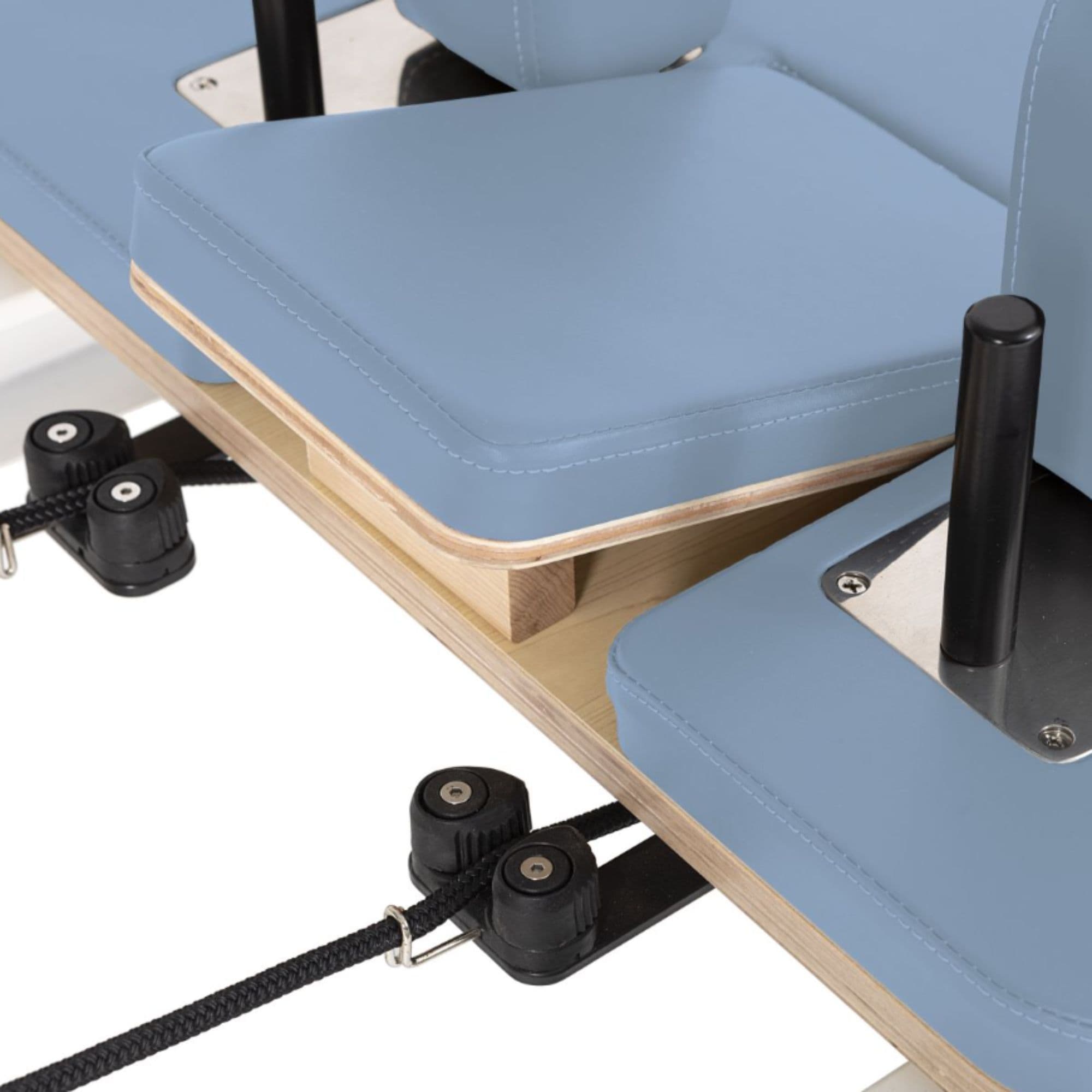 Nubium Reformer Close-Up View Of Ocean Blue Upholstery And Shoulder Rest Assembly