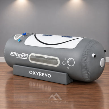 OxyRevo Elite32 Hyperbaric Chamber Angled View Of Gray Color On Wooden Floor And Gray Walls