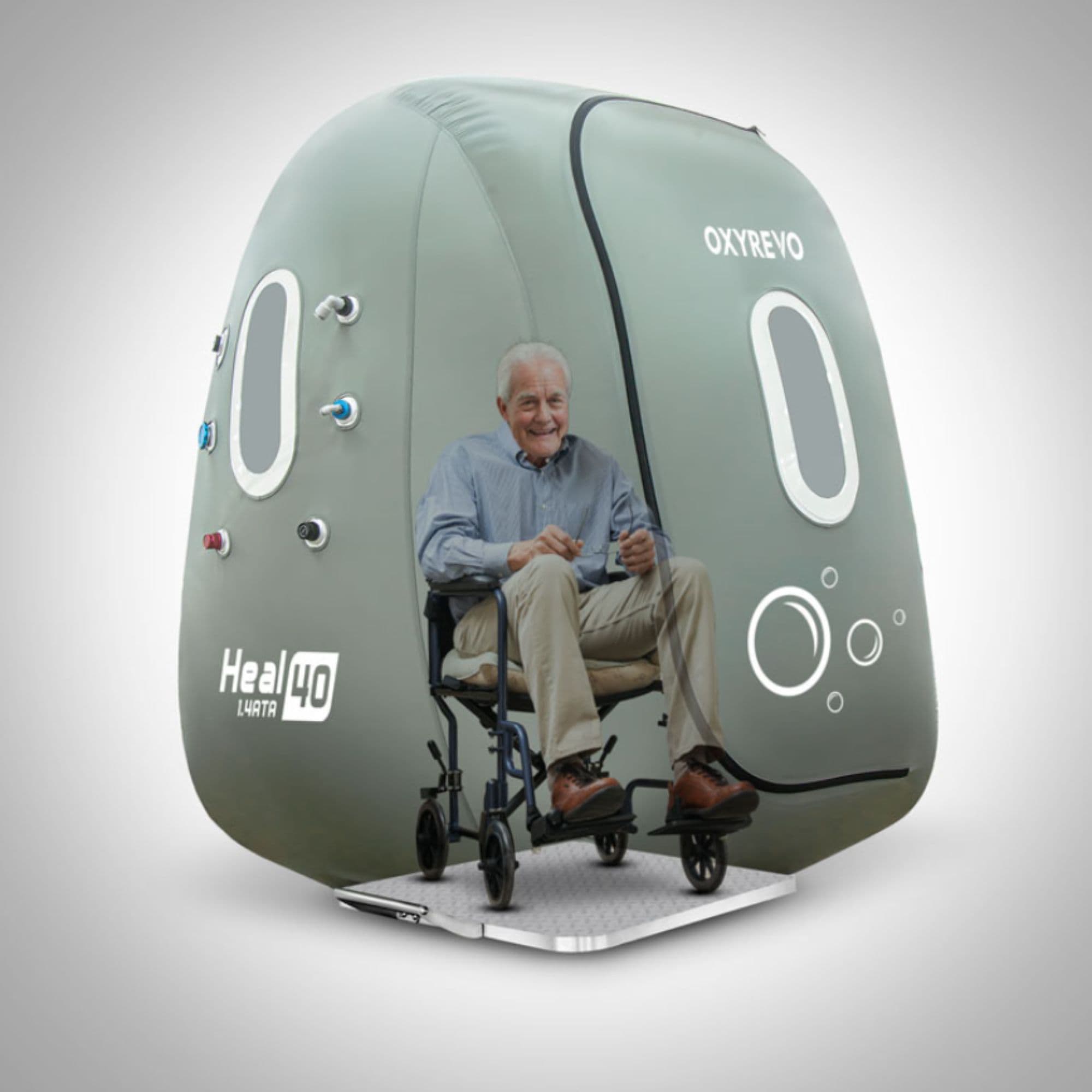 OxyRevo Heal40 Wheelchair Hyperbaric Chamber Showing Wheelchair Accessibility With An Old Man