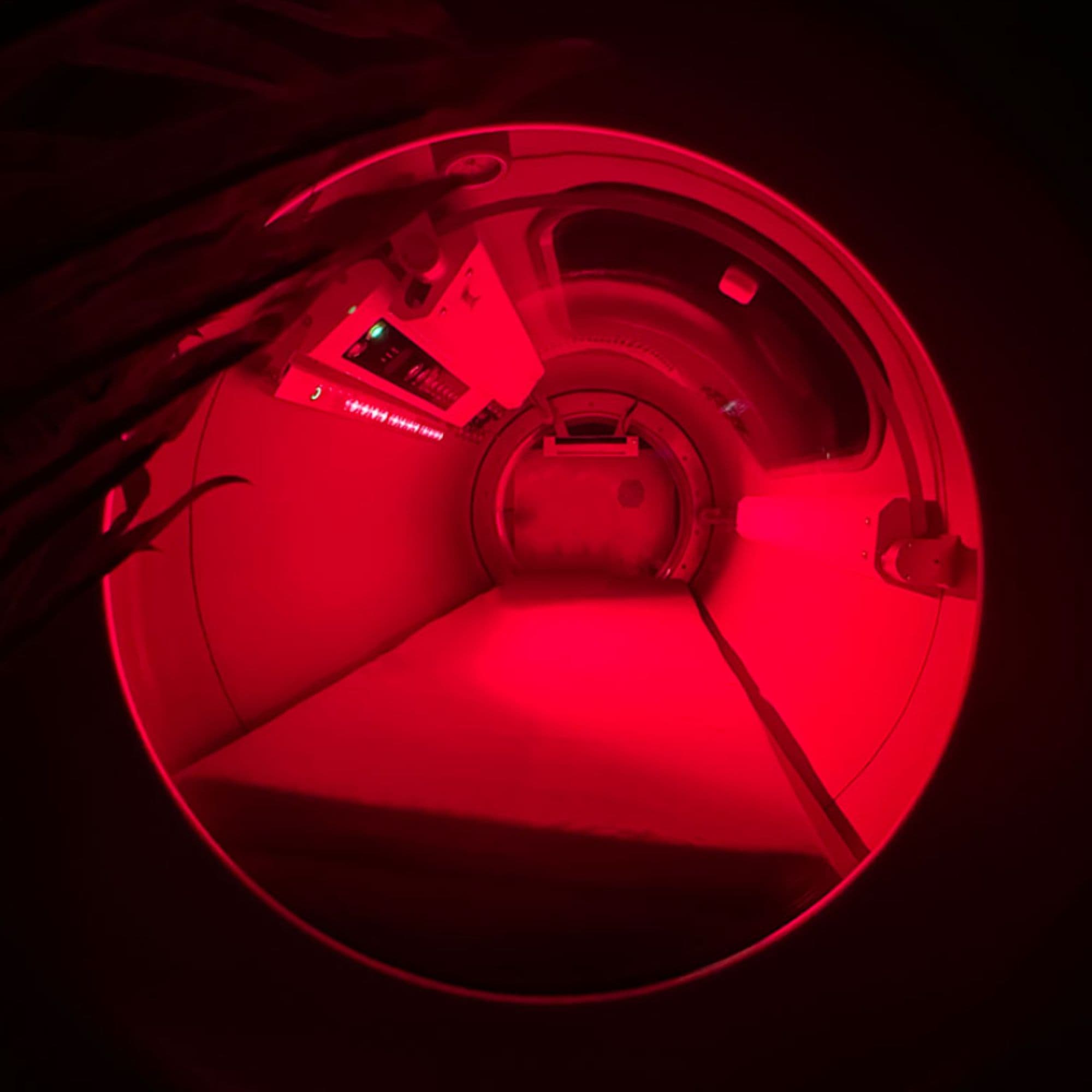 OxyRevo Quest36 Hyperbaric Chamber Interior Rear View In A Dark Room