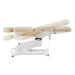 Pavo 4-Motors Swivel Medical Spa Treatment Table Beige Variant Side View Fully Reclined Demonstrating Adjustable Range Positions On White Background
