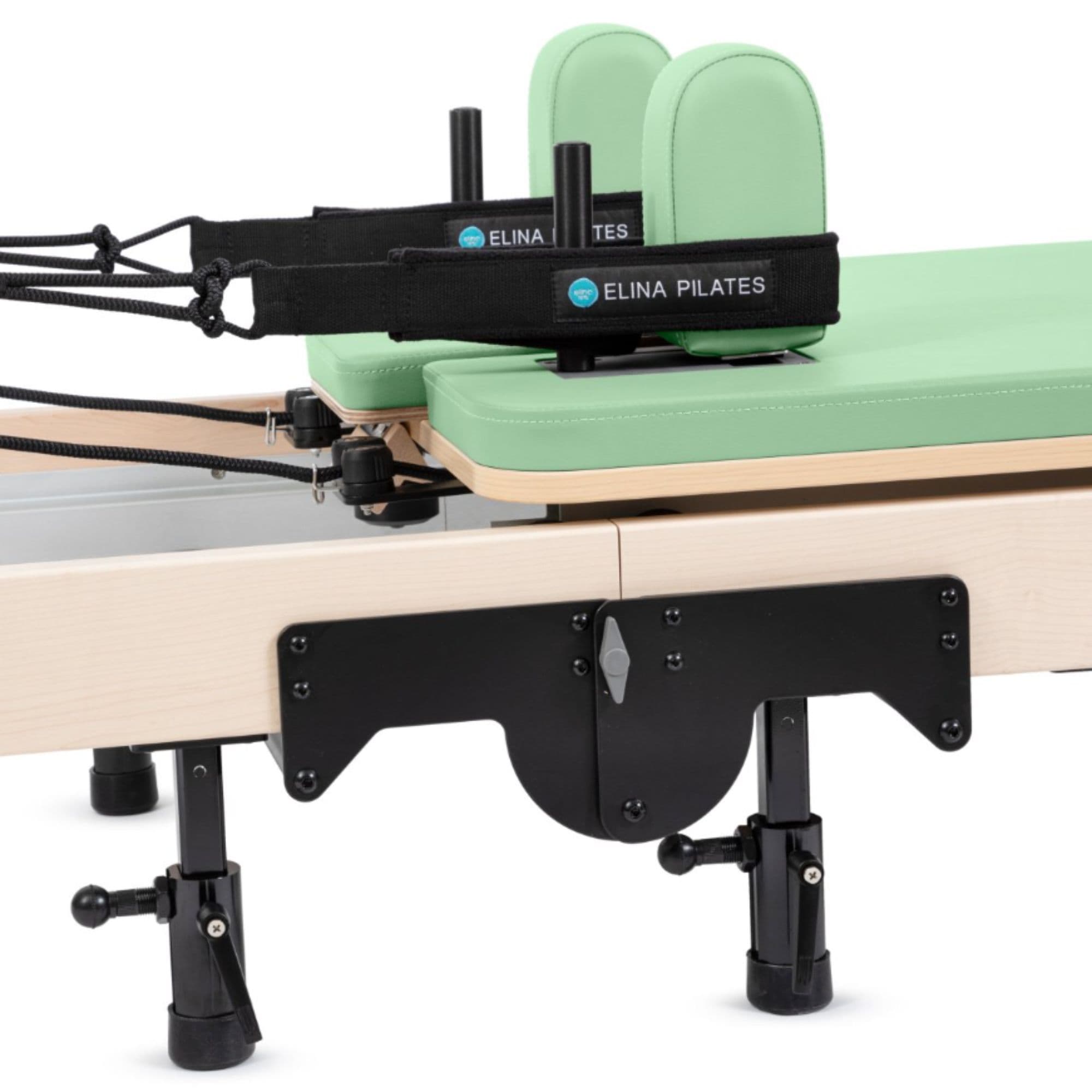 Reformer Elina Pilates Foldable for Home Plus Box  Green Variant Close-Up View Of The Carriage And Adjustable Shoulder Rests