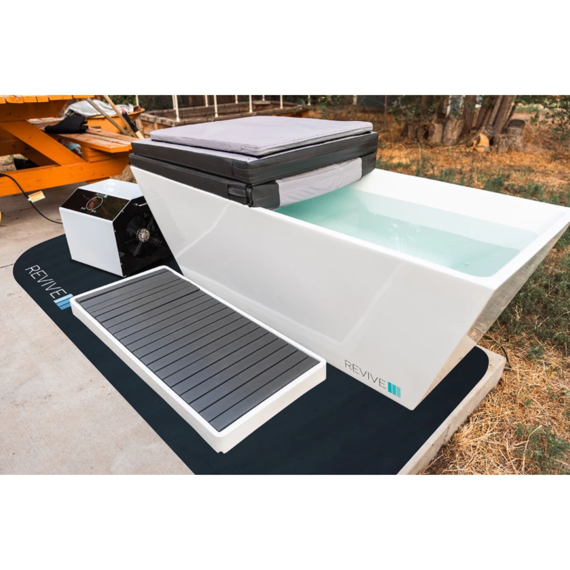 Revive Cushioned Cold Plunge Landing Mat Front Angle View In Outdoor Setting