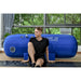 ST702 1.5 ATA Hyperbaric Chamber With A Boy Sitting In The Floor By Large Glass Windows With Greenery Views (