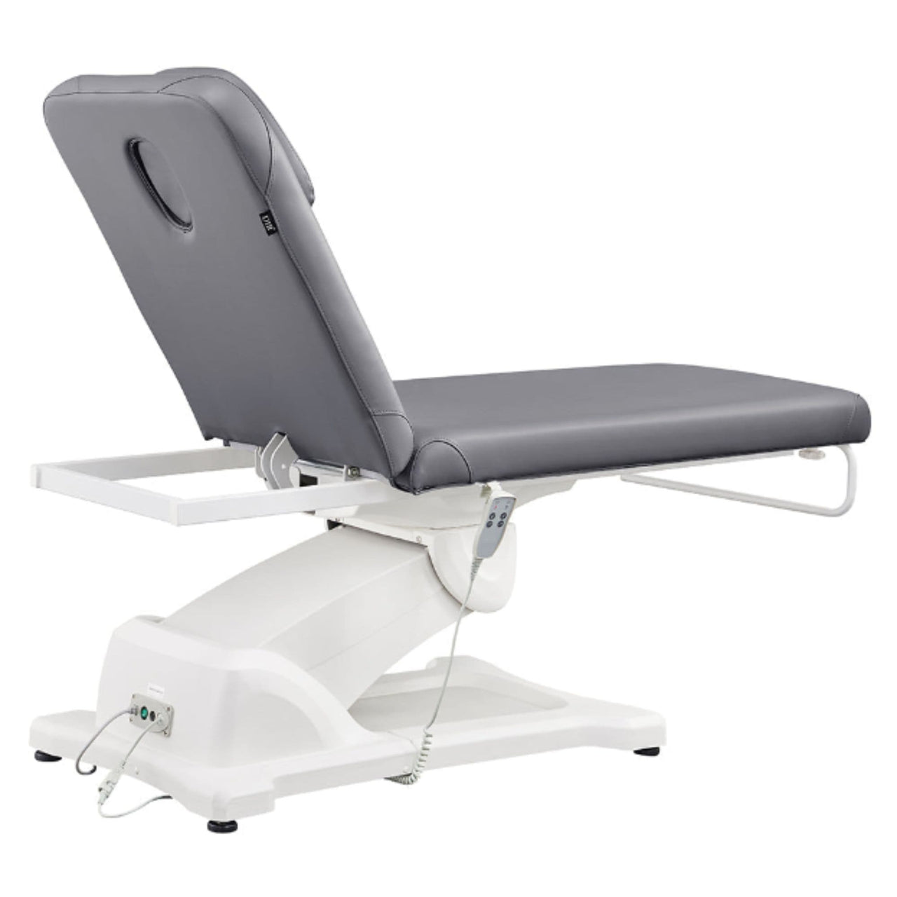 Serenity Electric Treatment Table Rear View Of Gray Color And Reclined On Head Section With Remote Control On White Background