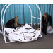 Summit to Sea Compact Multi-Person Hyperbaric Chamber Two Women Setting Up Showing Support Frame And Exterior
