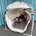 Summit to Sea Grand Dive Pro Plus 60-Inch Hyperbaric Chamber Front Angle View Woman Relaxing In A Reclining Chair Inside