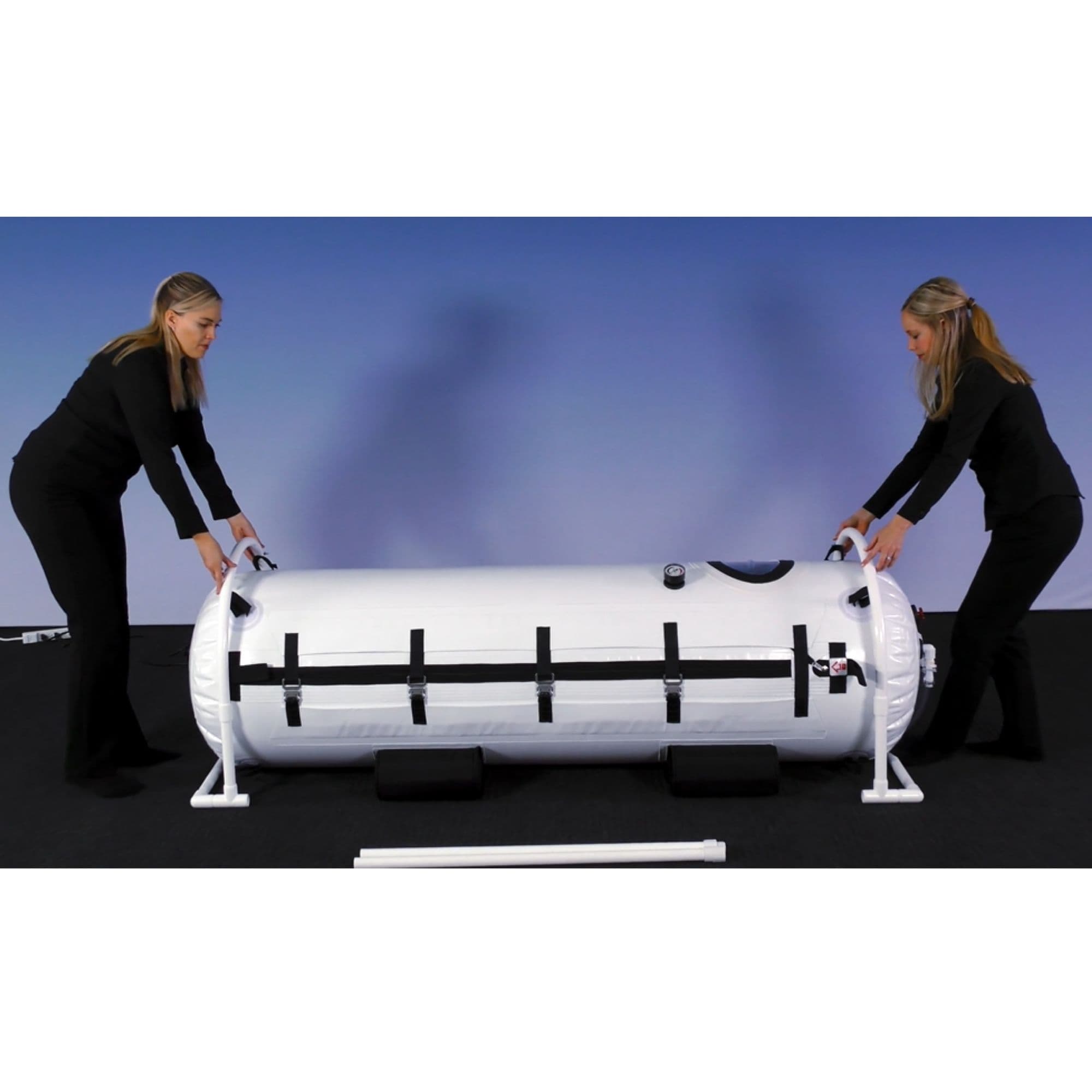 Summit to Sea Shallow Dive Hyperbaric Chamber – 26-Inch Fully Inflated With Two Women Holding It