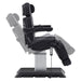 Sydney Quad-Motor Esthetician Treatment Chair Black Side View Demonstrating Chair And Stirrup Adjustment Positions On White Background