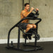 The Abs Company Abcoaster CTL With A Man Performing An Abdominal Core Training On Gym Setting