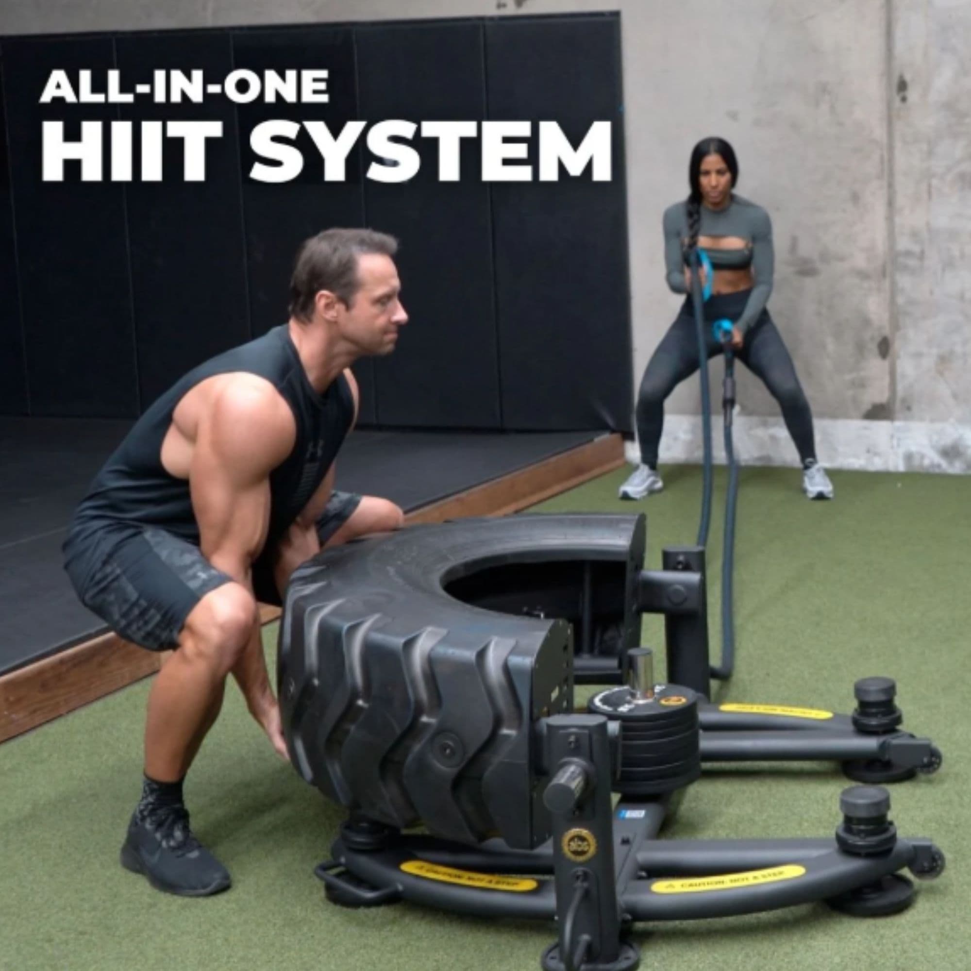 The Abs Company TireFlip 180 Tire Flip Machine – ABS4004-02 Two-Person Performing The Full-Body HIIT Workout