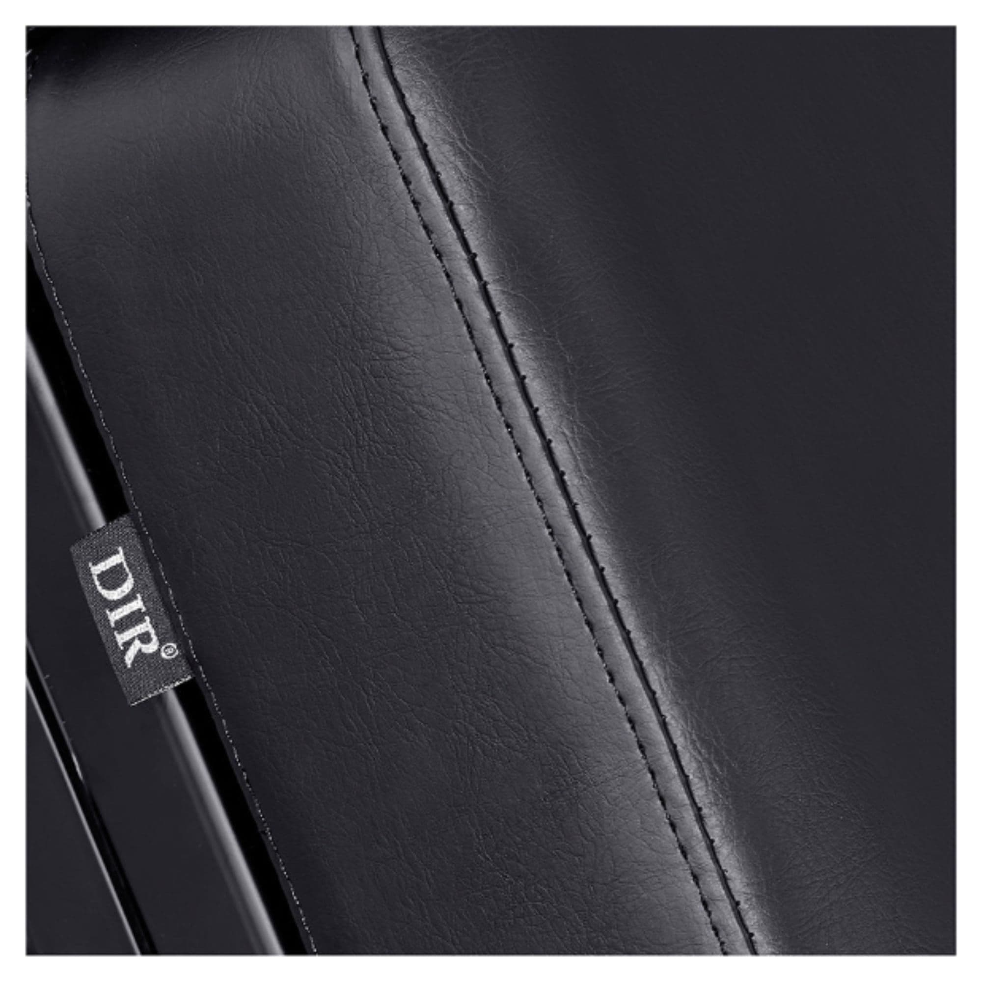 Tranquility 4-Motors Electric Medical Spa Treatment Table Close-Up View Of Black Upholstery With Brand Name And Stitching On White Background