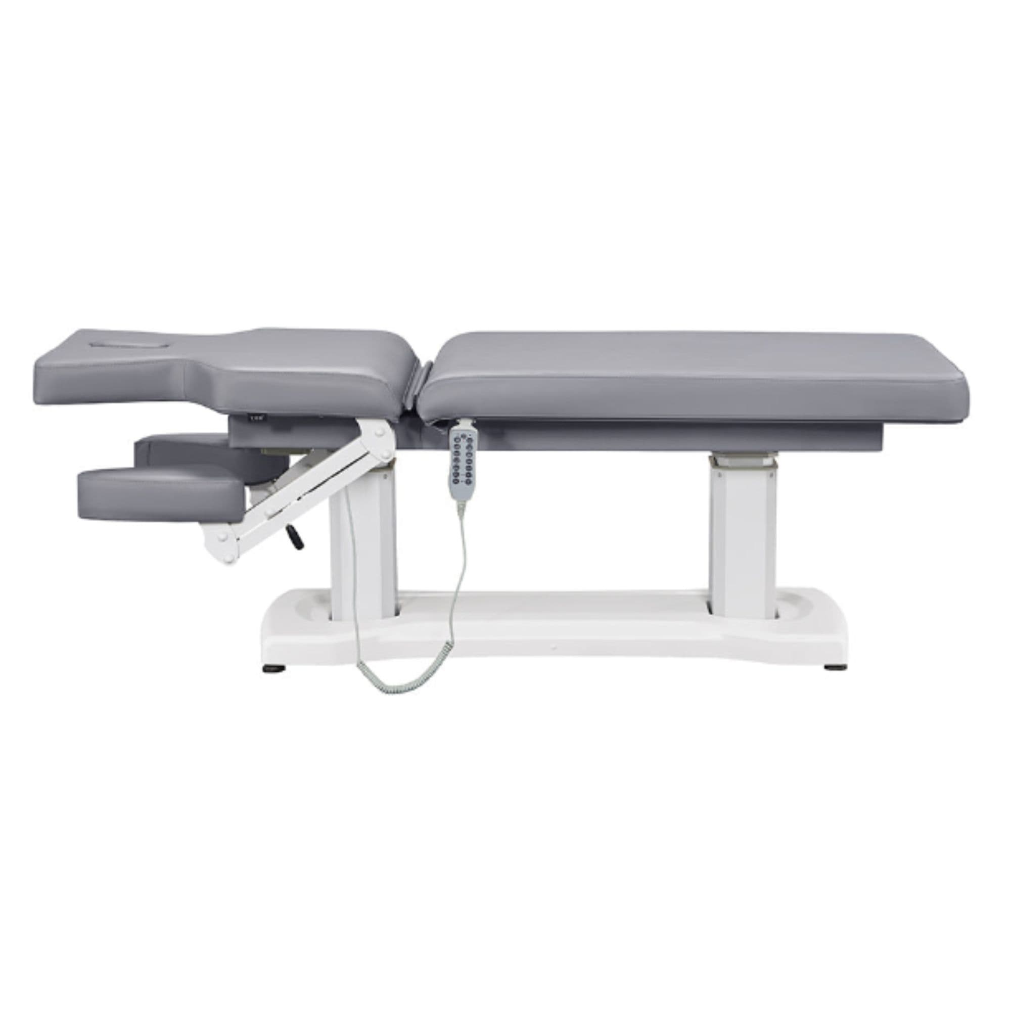 Tranquility 4-Motors Electric Medical Spa Treatment Table Side View And Fully Reclined Of Gray Variant With Slightly Adjusted Side Cushion And Remote Control On White Background