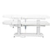 Tranquility 4-Motors Electric Medical Spa Treatment Table Side View And Fully Reclined Of White Variant Showing An Up And Down Adjustment With Remote Control On White Background