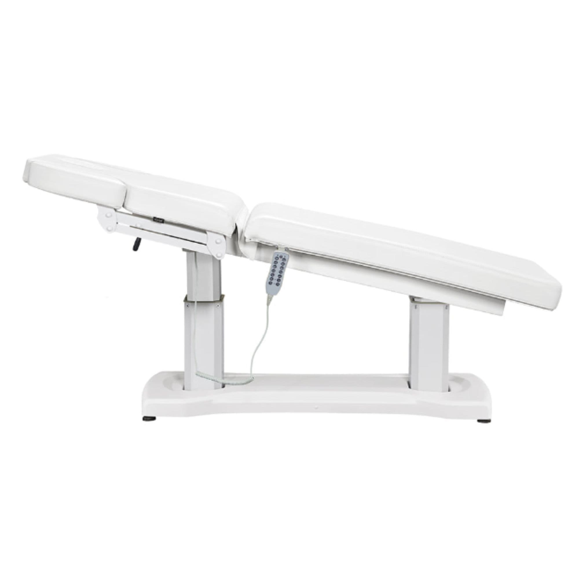 Tranquility 4-Motors Electric Medical Spa Treatment Table Side View Of White Variant Fully Reclined Chair And Raised Head Section With Remote Control On White Background