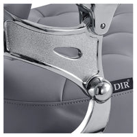 Thumbnail for Vanquish Barber Chair Close-Up View Of Decorative Frame Detail And Gray Upholstered Seat