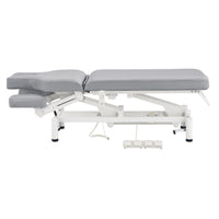 Thumbnail for VitalEarth 2-Motors Treatment Table and Wellness Therapy Bed Gray Color Side View And Fully Reclined With Slightly Down Side Cushion Foot Control On White Background