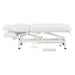 VitalEarth 2-Motors Treatment Table and Wellness Therapy Bed White Color Side View And Fully Reclined With Slightly Down Side Cushion Foot Control On White Background