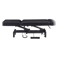 Thumbnail for WellRelax 2-Motors Therapy Treatment Table with Tilting Cradle Pillow Black Color Side View Fully Reclined With Foot Control On White Background