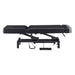 WellRelax 2-Motors Therapy Treatment Table with Tilting Cradle Pillow Black Color Side View Fully Reclined With Foot Control On White Background