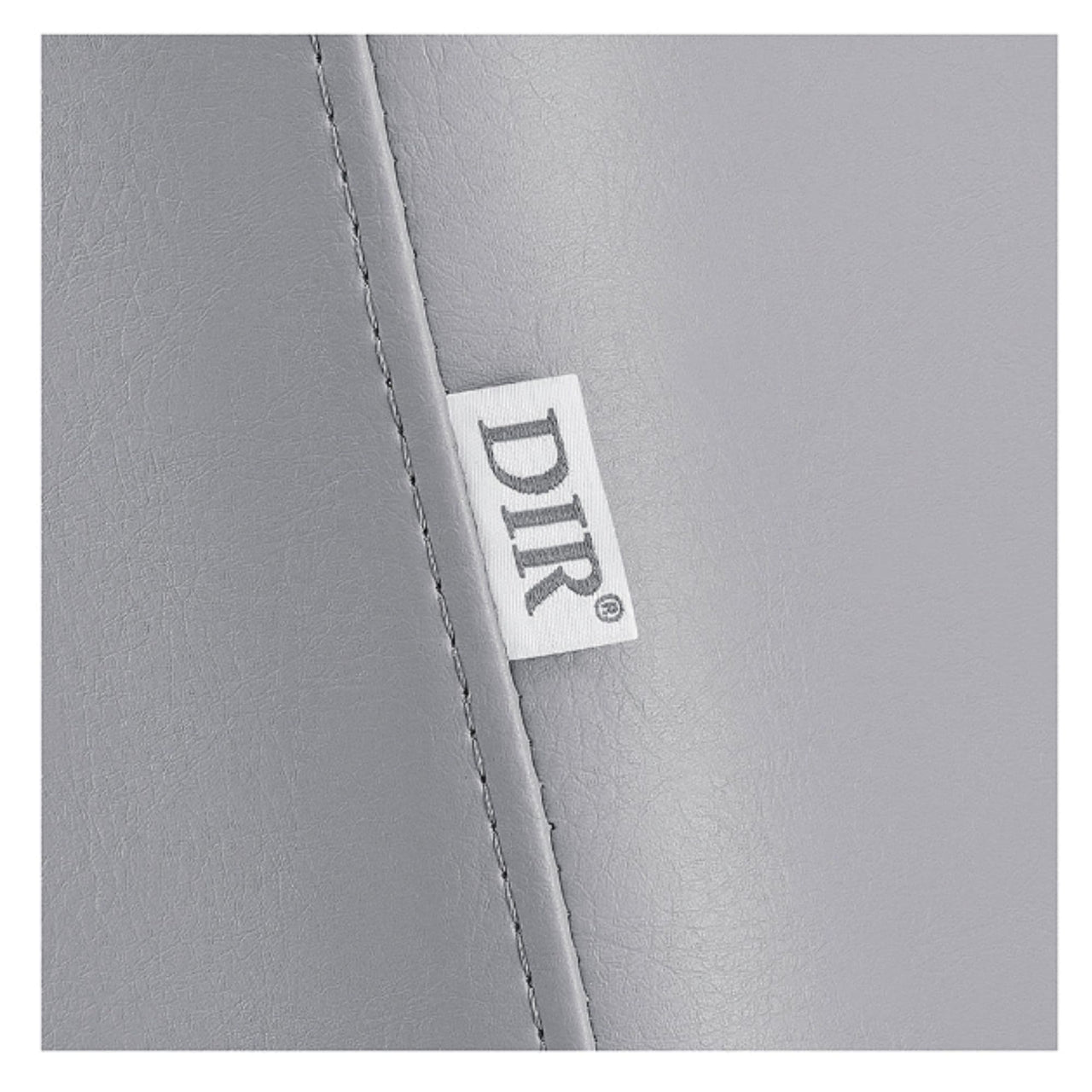 WellRelax 2-Motors Therapy Treatment Table with Tilting Cradle Pillow Close-Up View Of Gray Upholstery With Brand Name