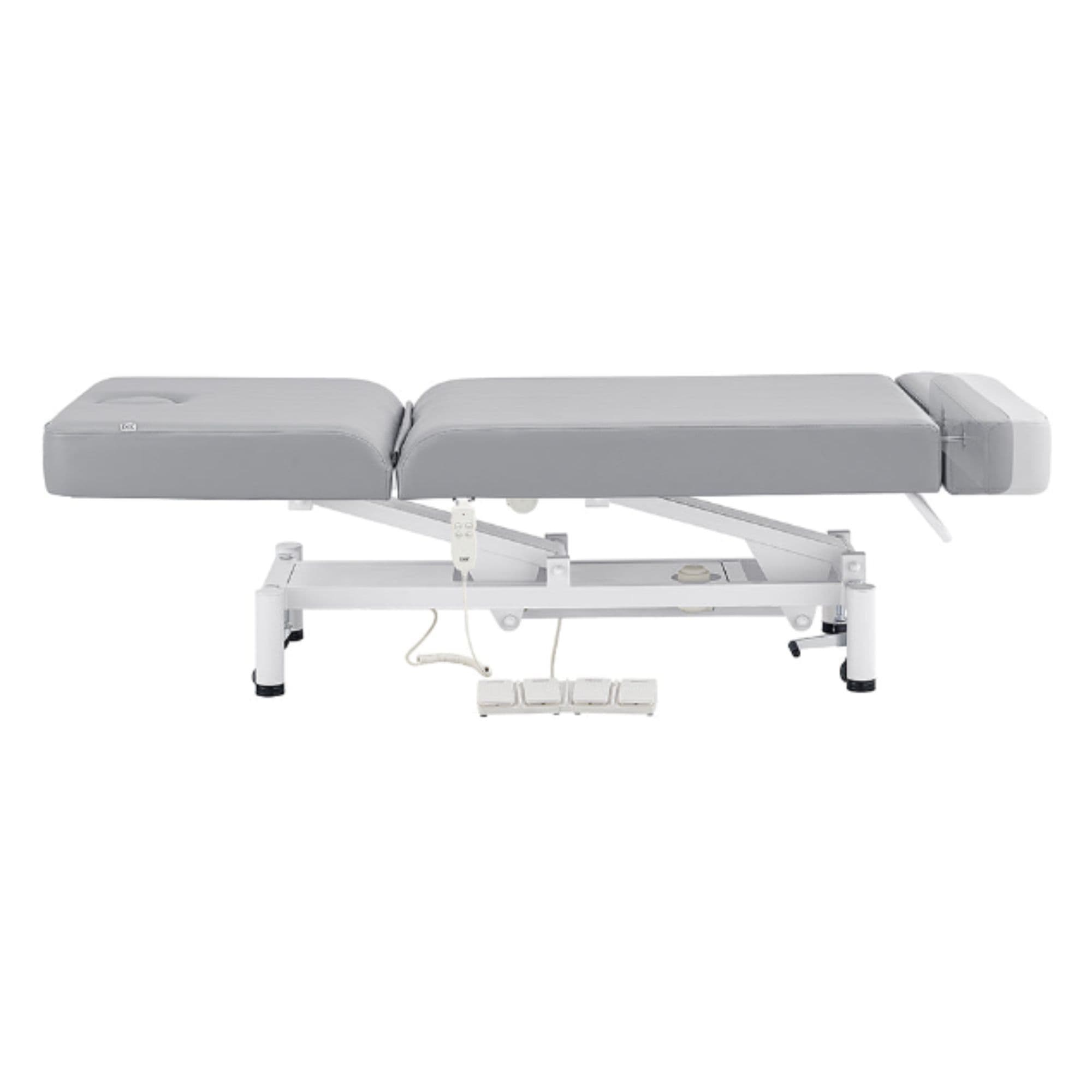 WellRelax 2-Motors Therapy Treatment Table with Tilting Cradle Pillow Gray Color Side View Fully Reclined With Foot Control On White Background