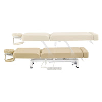 Thumbnail for WellRelax 2-Motors Therapy Treatment Table with Tilting Cradle Pillow Side View And Fully Reclined Of Beige Color Showing An Up And Down Adjustment With Foot Control On White Background