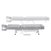 Thumbnail for WellRelax 2-Motors Therapy Treatment Table with Tilting Cradle Pillow Side View And Fully Reclined Of Gray Color Showing An Up And Down Adjustment With Foot Control On White Background