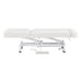 WellRelax 2-Motors Therapy Treatment Table with Tilting Cradle Pillow White Color Side View Fully Reclined With Foot Control On White Background