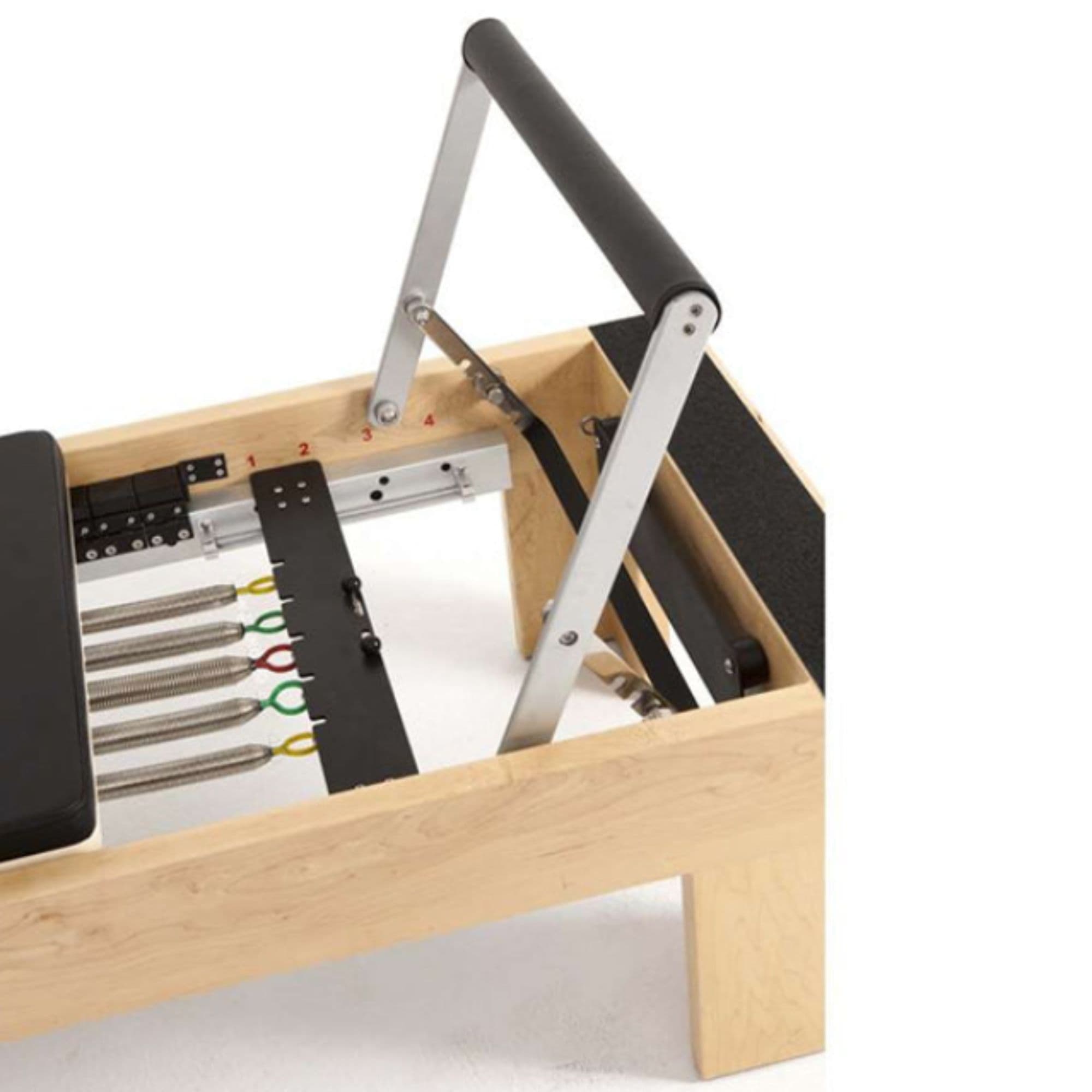 Wood Physio Reformer Close-Up View Of Foot Bar And Color Coded Springs