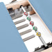 Wooden Reformer Lignum Close-Up View Of Color Coded Spring Resistance Controls On White Background