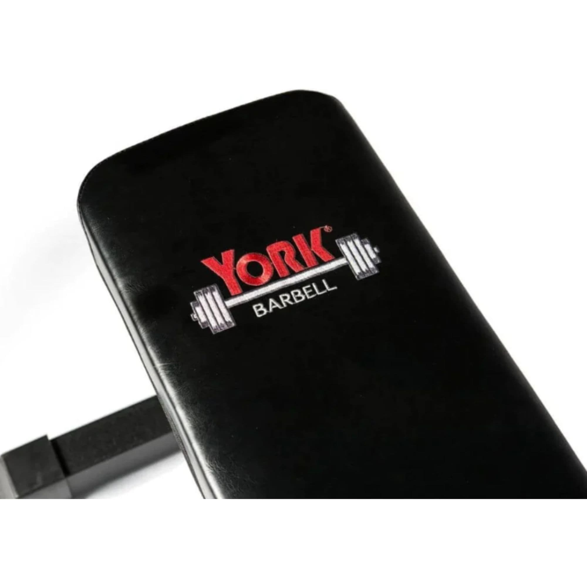 York Barbell FTS Flat Bench Detail View Of Upholstery With Logo On White Background