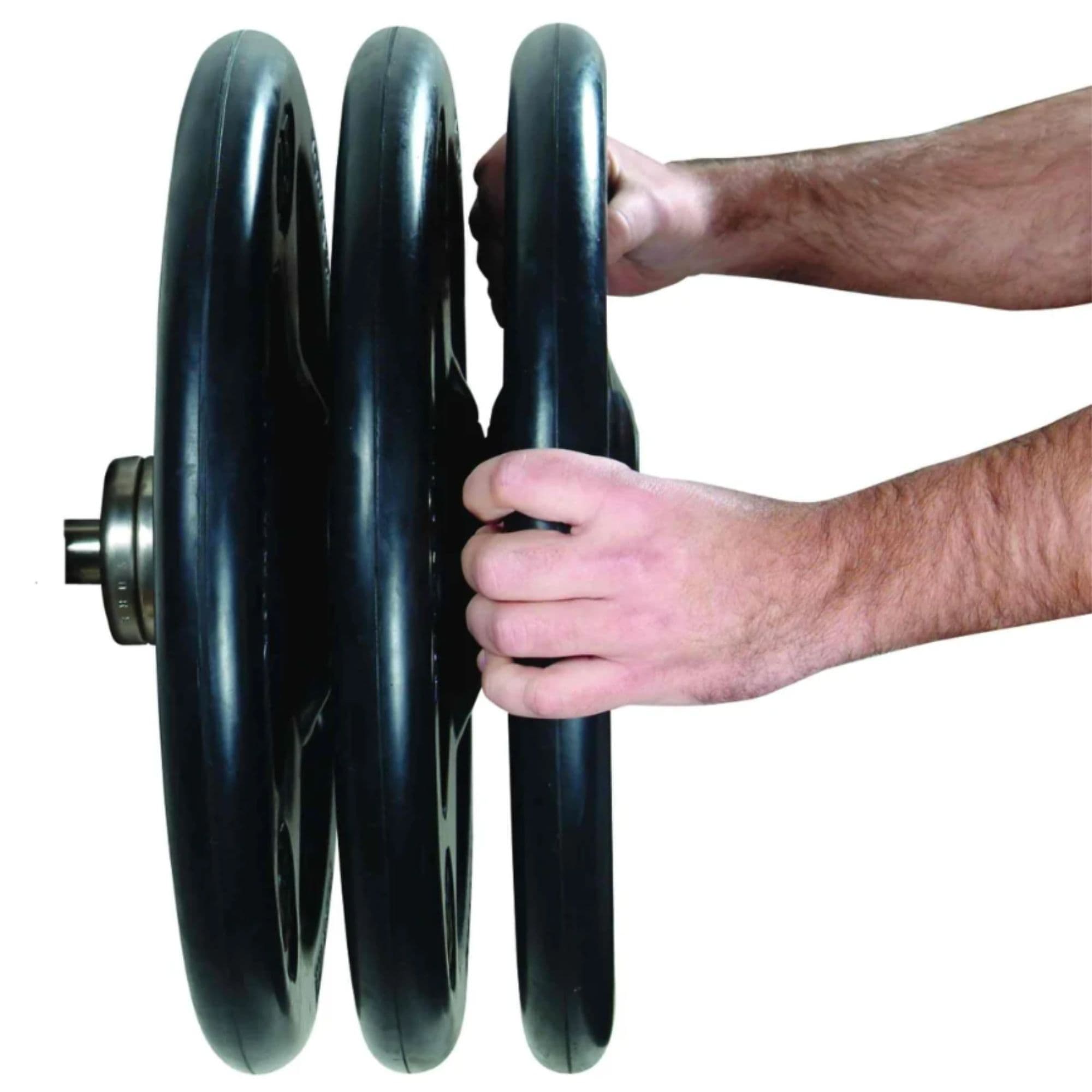 York Steel ISO-GRIP 300lb Olympic Set With Hands Loading Weight Plates Onto The Bar On White Background