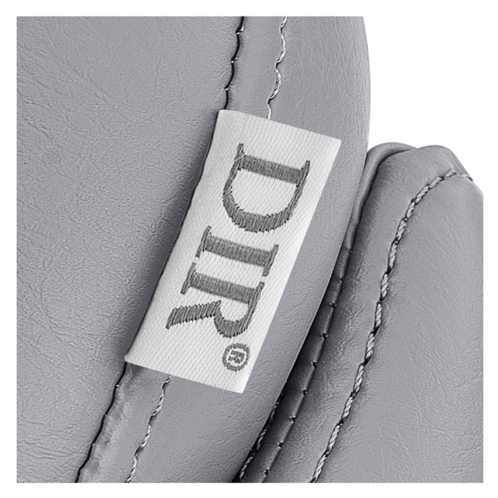 Yume Dreaming Electric Salon Backwash Station Close-Up View Of Vertical Stitched Gray Upholstery With Brand Name