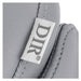 Yume Dreaming Electric Salon Backwash Station Close-Up View Of Vertical Stitched Gray Upholstery With Brand Name