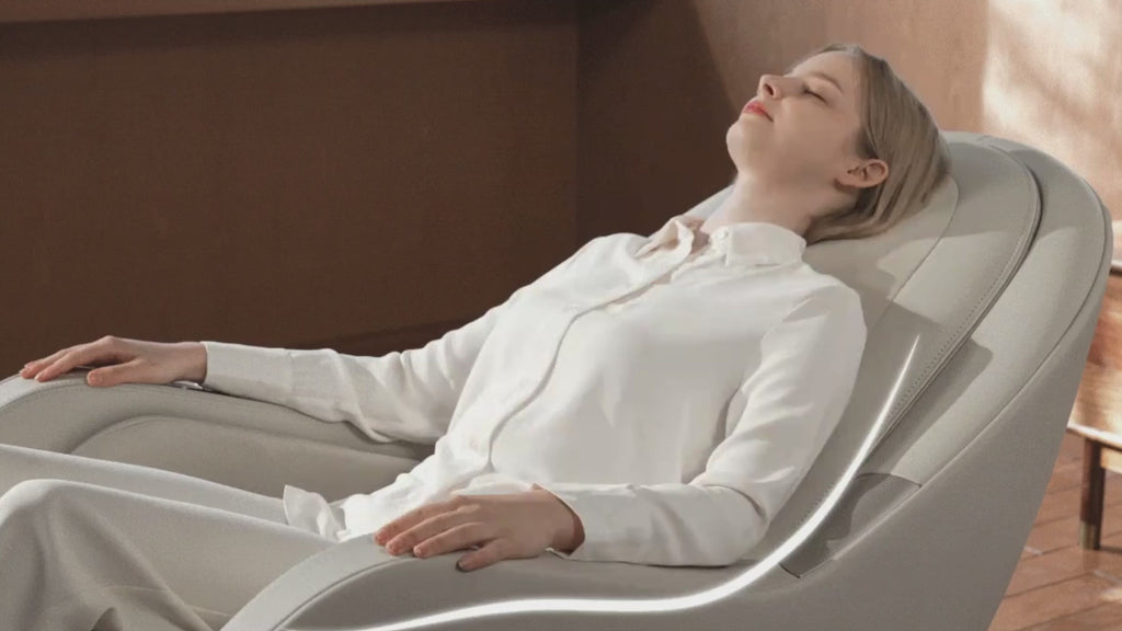 Ceragem M6 With A Woman Demonstrating While Relaxing